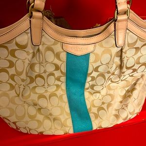 Coach shoulder purse, gently used no stains and no snags on fabric